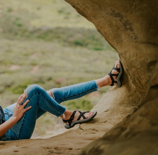 Woman in cave with cute sandals